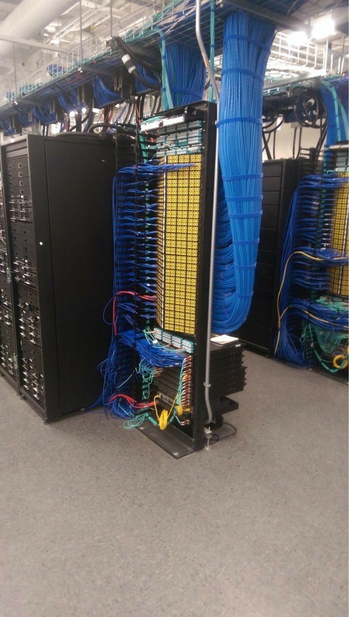 Blue high-density cabling across a data hall